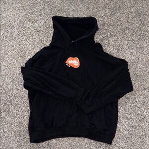 Kittenish Black Hoodie with Orange Lip Patch
